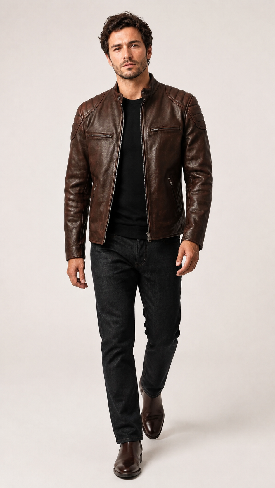 Full-length walking shot of the vintage brown biker jacket — British model